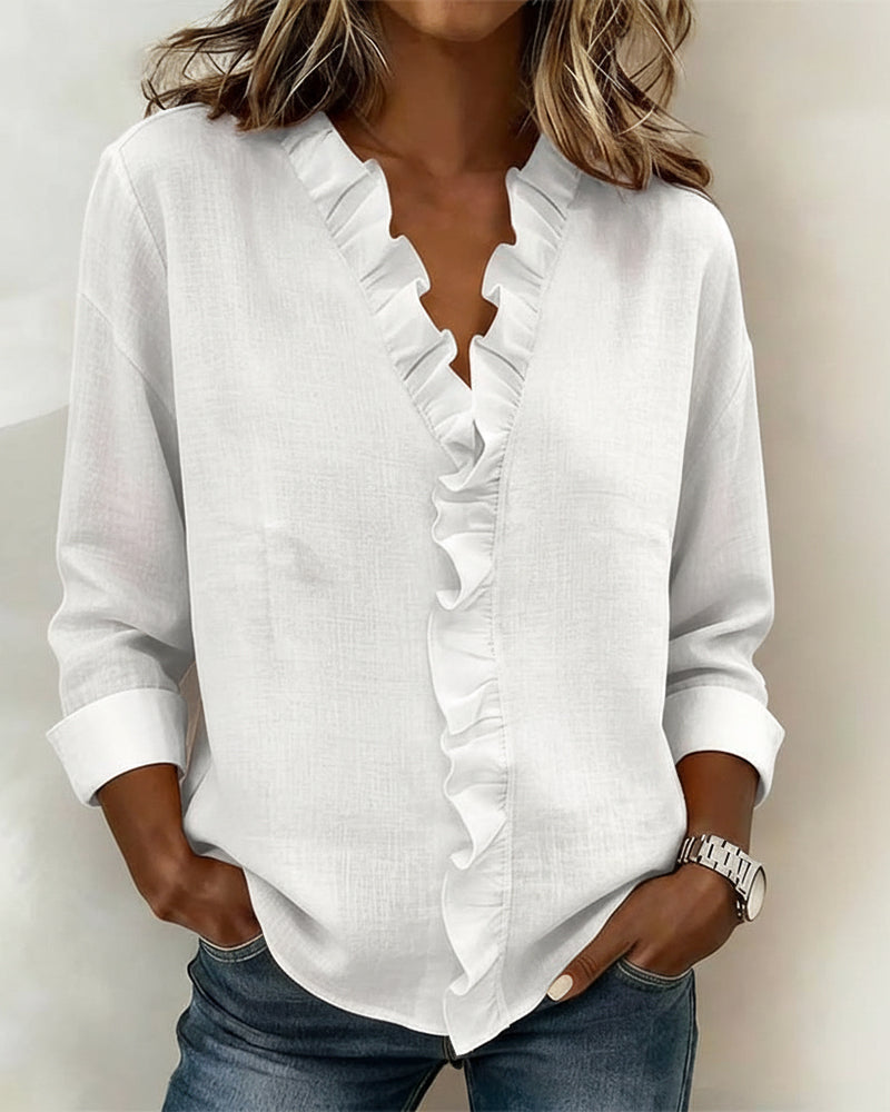 AMPARO | Blusa con cuello en V y volantes