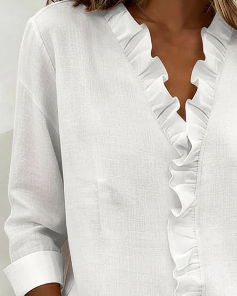 AMPARO | Blusa con cuello en V y volantes