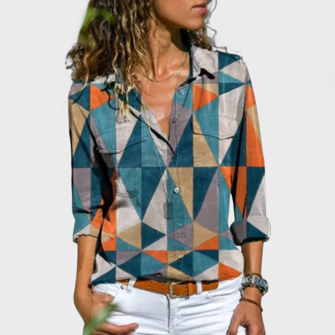 AMPARO | Blusa con mangas abullonadas