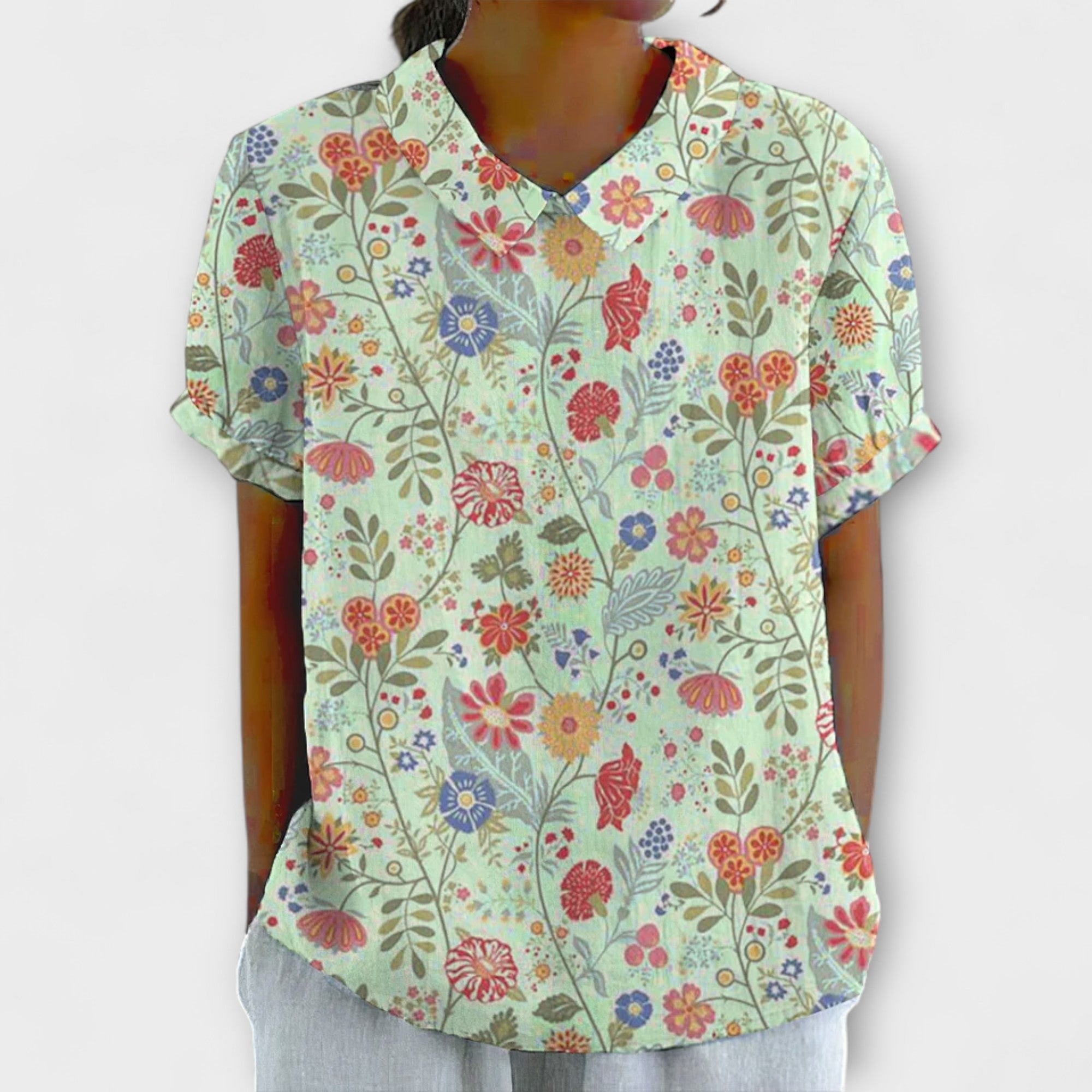 EMILIA | Blusa floral con hombros caídos