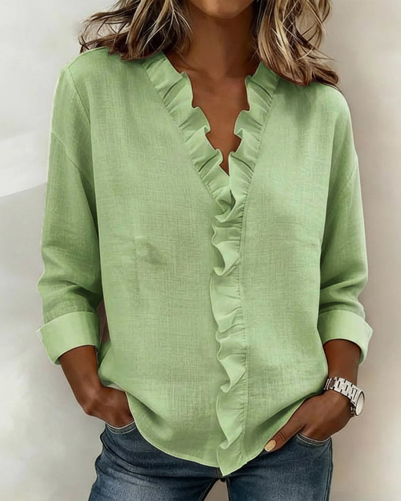 AMPARO | Blusa con cuello en V y volantes